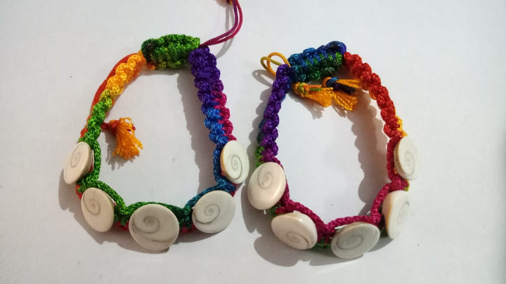 Gomti chakra bracelet with coloured thread