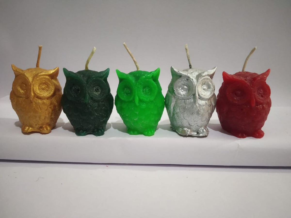 Owl candle for prosperity